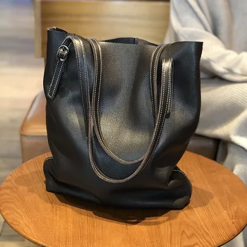 Нова дамска ръчна чанта през рамо 2023 година освобождаването от телешка кожа с голяма лента за глава Проста чанта-тоут голям капацитет Кожа